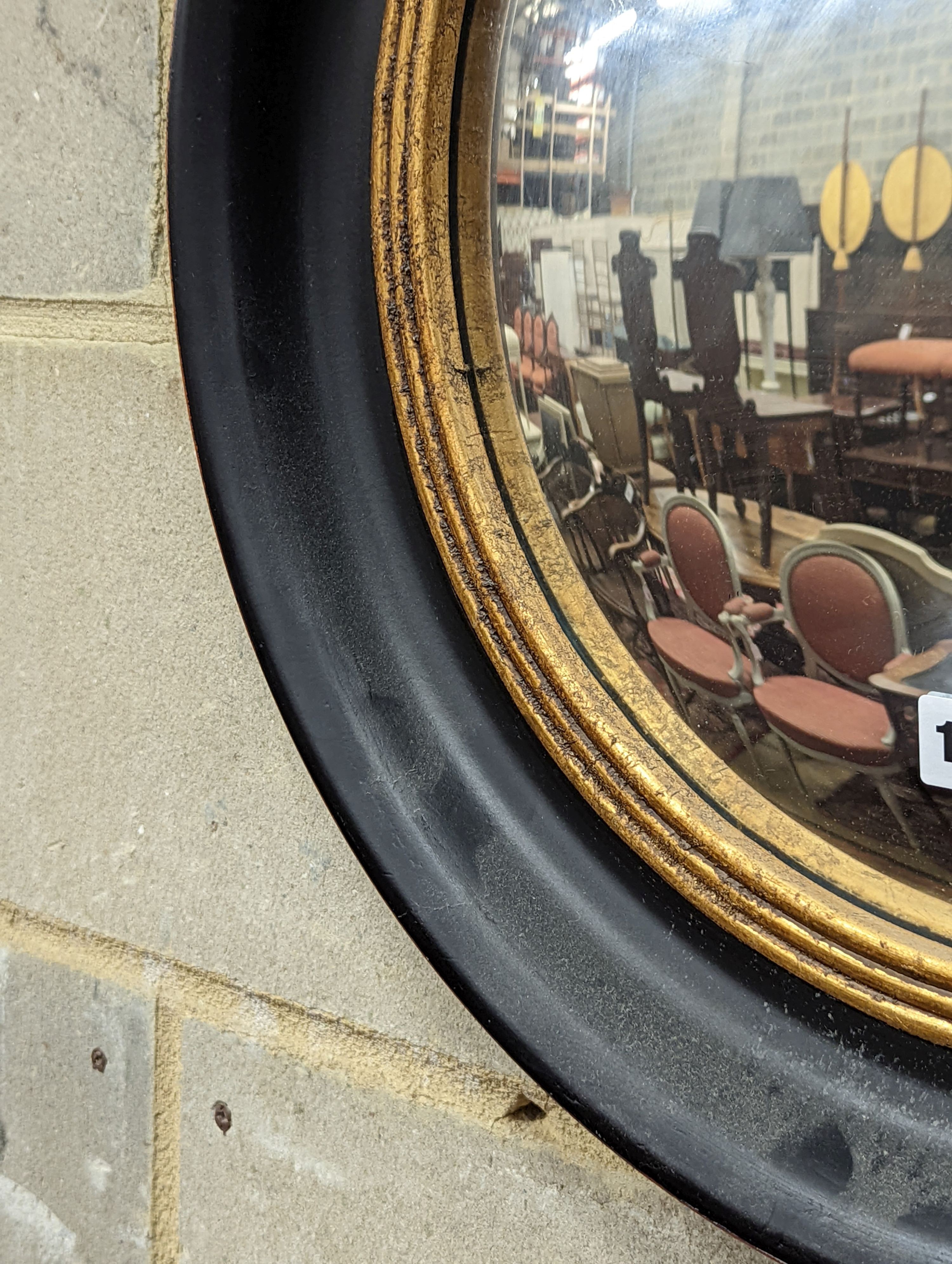 A Regency style circular convex wall mirror, diameter 53cm